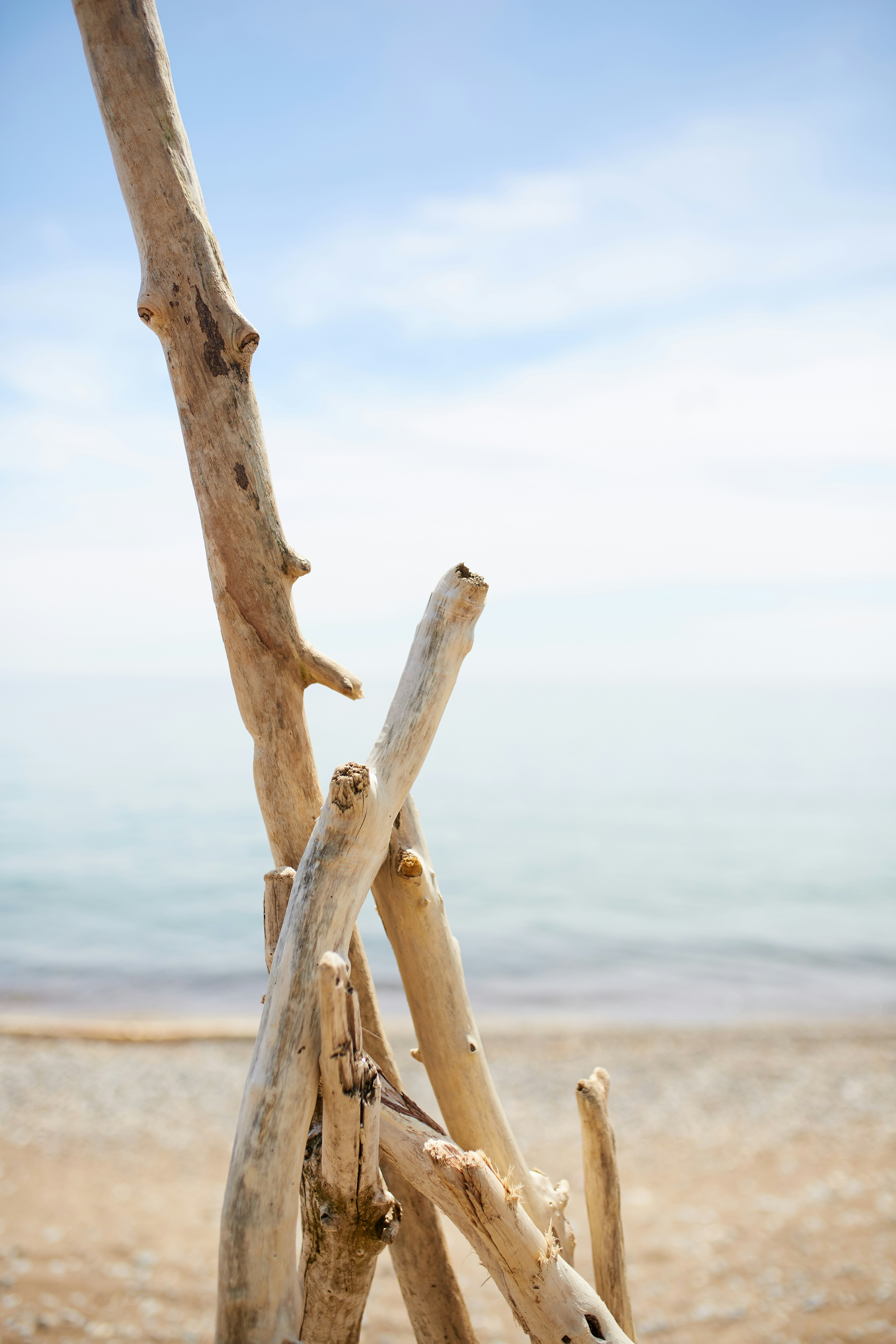 Sticks stacked together to form a triangle